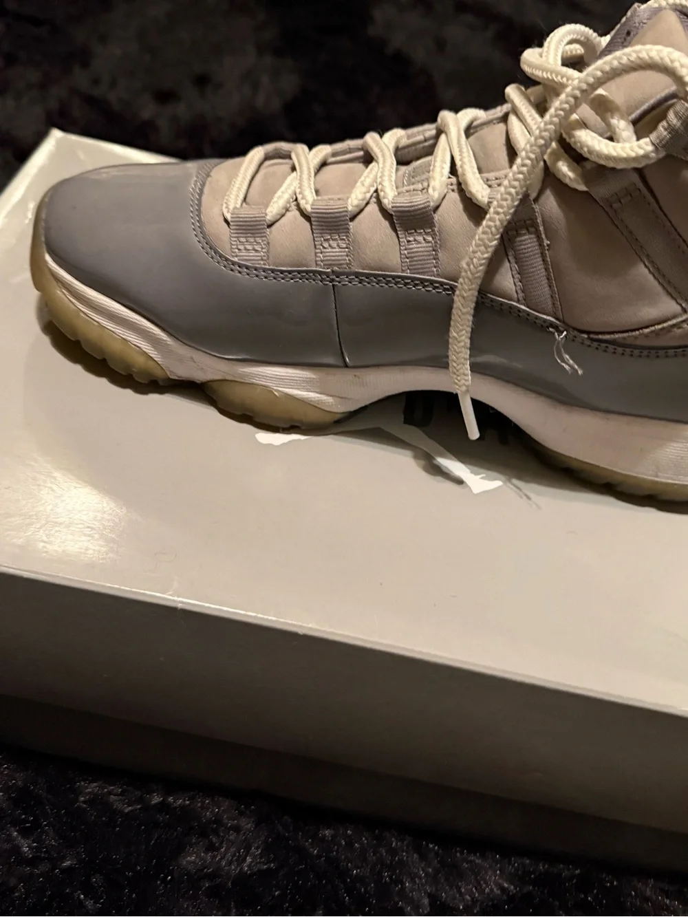 Jordan Retro 11 High-Top Sneakers in Grey and White